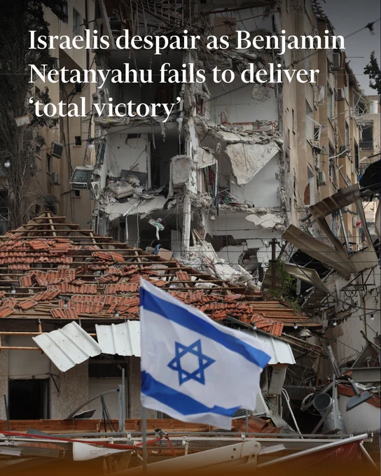 Image description: An Israeli flag at the site of a damaged residential area after Iranian ballistic missiles hit Rehovot, central Israel, in June 2025. Credit: Abir Sultan/EPA-EFE/Shutterstock. Overlaid text reads: Israelis despair as Benjamin Netanyahu fails to deliver ‘total victory’
