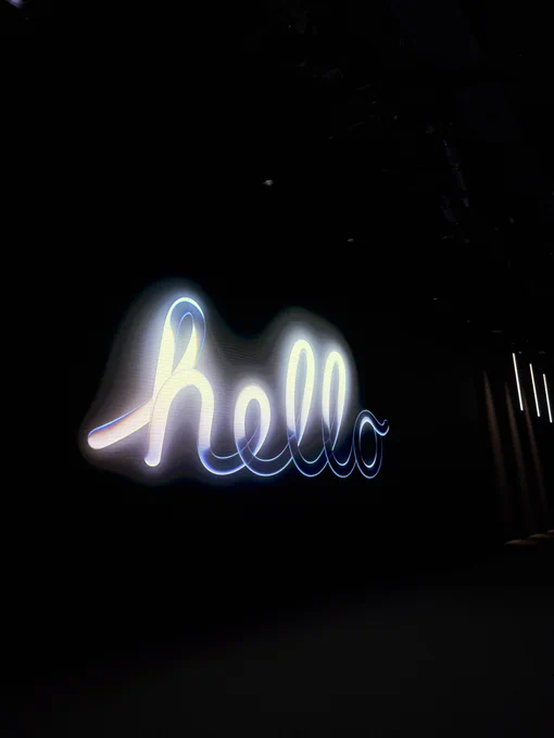 Photo of the “hello” animated text logo on screen.