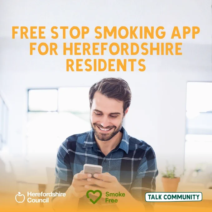 Free stop smoking app for Herefordshire residents, featuring a smiling man using his phone.