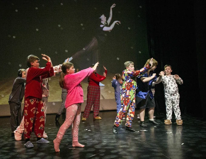 CT on stage dancing in pajamas