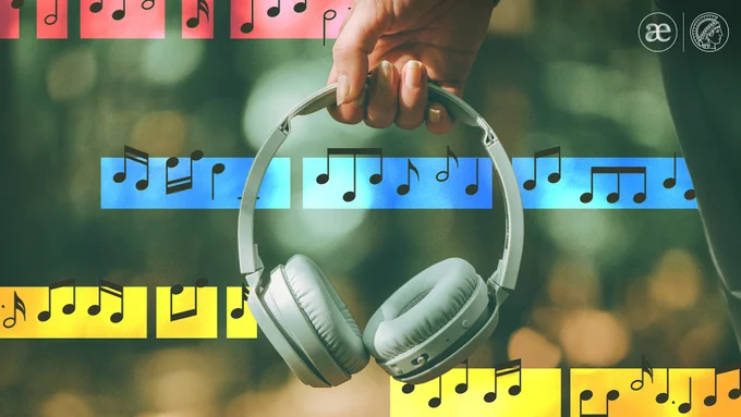 Photo of a hand holding headphones with musical notes in the background.