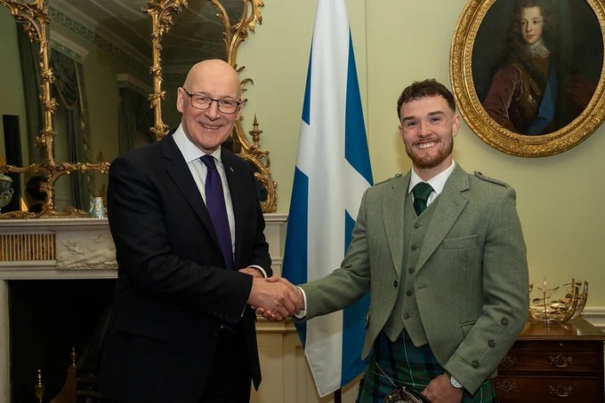 First Minister John Swinney with Scotland fan and charity fundraiser Craig Ferguson at Bute House