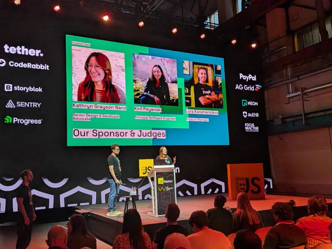 A person presenting on stage