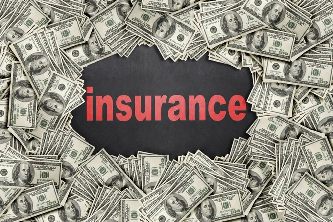 "insurance" text with pile of money