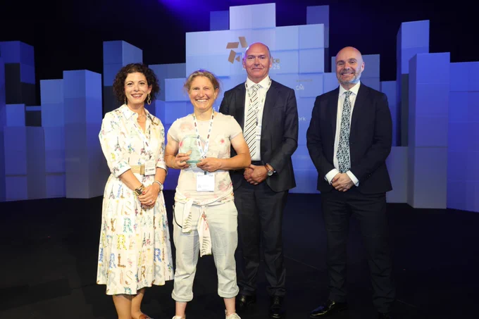 Dr Jess Harvey receiving her leadership award from colleagues at the Chartered Management Institute, Sir Jim Mackey, NHS Chief Executive  and Duncan Burton, Chief Nursing Officer for England.