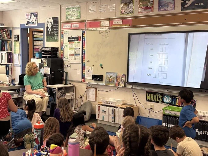 Karen working with students