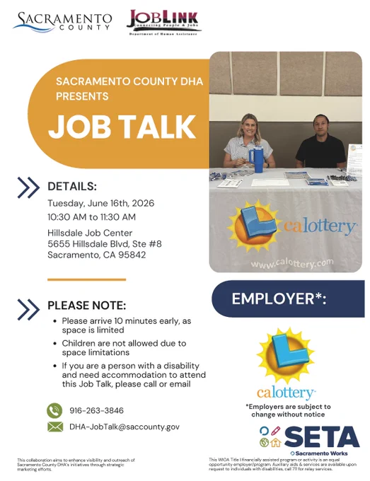 Two representatives at a Sacramento County Job Talk event table with informational materials and a California Lottery banner in a community center.