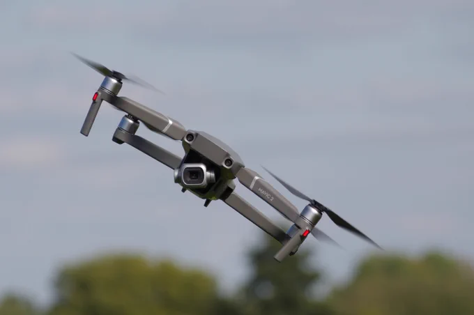This image shows a drone flying in the air.