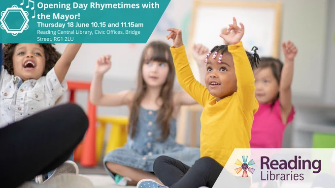 Children raising their arms in a Rhymetimes session with the Mayor at Reading Library.