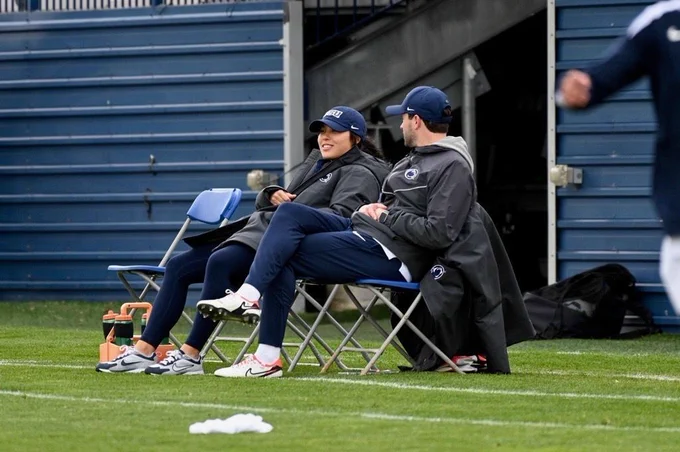 Abby Han on the soccer field with another coach.