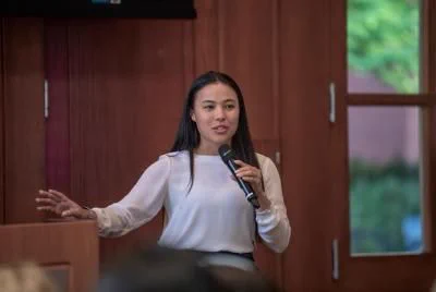 Abby presenting at an event.