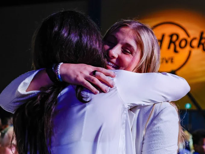 Kiara Zanon hugging teammates at the PWHL Draft