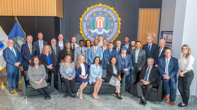 Image is a photo of FBI Boston Special Agent in Charge with members of FBI Boston's 2026 Citizens Academy class. 