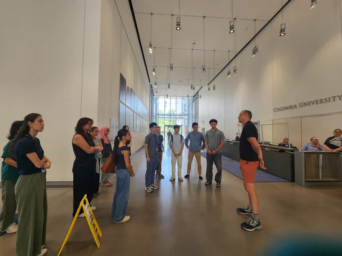 SRP interns learn about neuroscience research from Dr. Darcy Peterka during a tour of the Zuckerman Institute. 