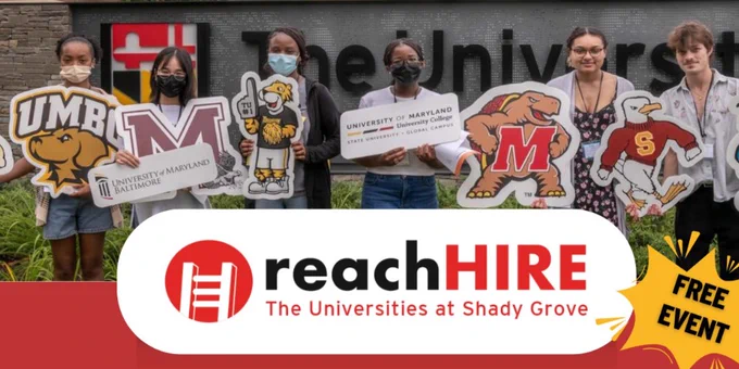 Group of students holding University of Maryland and UMBC mascot signs outside a building with reachHIRE event banner.