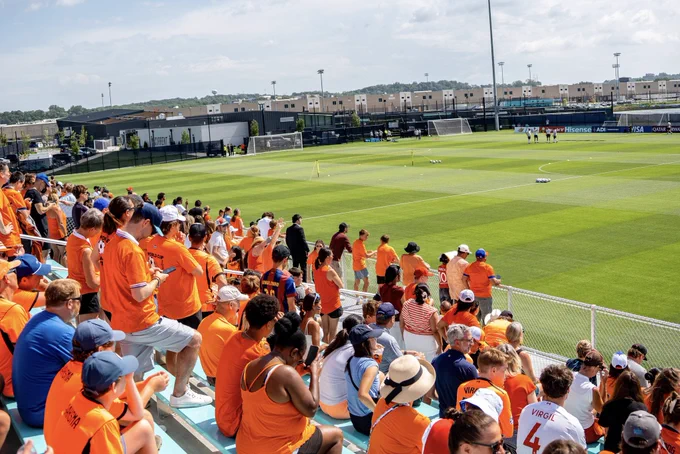 Wide shot of the orange crowd at Riverside Stadium