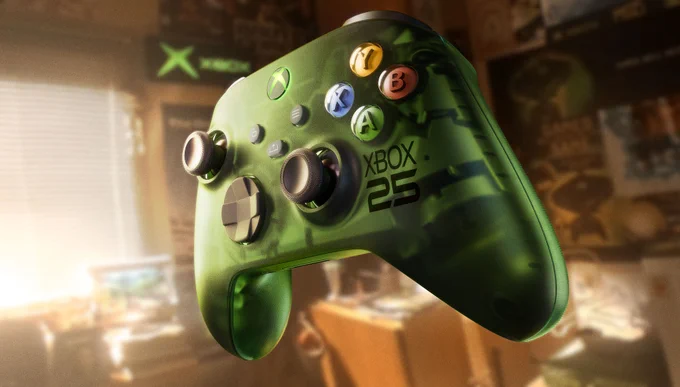 Limited-edition translucent green Xbox wireless controller with “Xbox 25” branding and colored ABXY buttons, shown in a close-up against a softly lit gaming setup background.