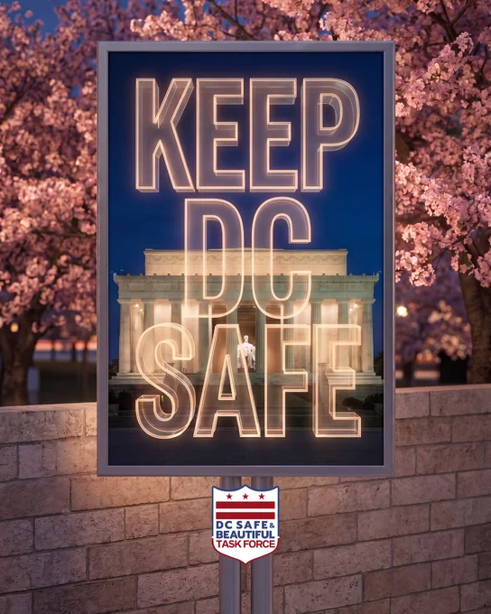 Illuminated sign reading 'KEEP DC SAFE' in front of the Lincoln Memorial at dusk with blooming cherry blossoms. D.C. Safe and Beautiful Task Force.