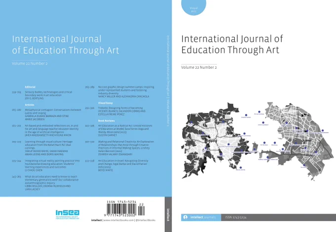 Cover of the International Journal of Education Through Art, Volume 22 Number 2, featuring a stylized map with blue and gray tones.