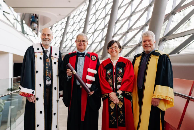 From left to right: Jacques Beauvais; Provost and Vice-President, Academic Affairs, of the University of Ottawa, Dr. Normand Voyer, Marie-Eve Sylvestre; President & Vice-Chancellor of the University of Ottawa and Louis Barriault, dean of the Faculty of Sciences of the University of Ottawa. They are all wearing ceremonial academic robes.