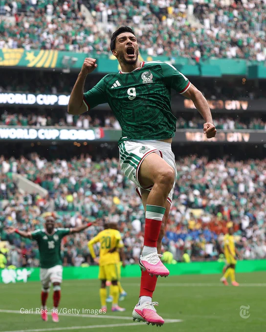 Raul Jimenez #9 of Mexico celebrates scoring his team's second goal.