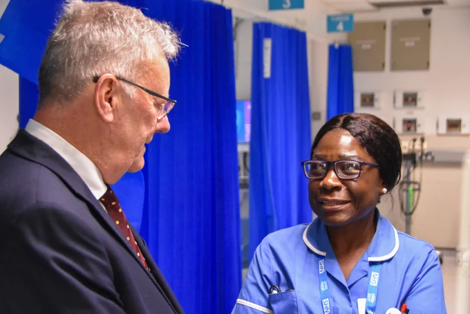 Health Minister Mike Nesbitt pictured speaking with a member of staff at the Mater Hospital in Belfast.
