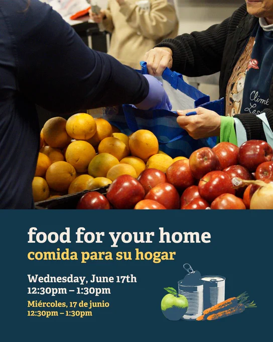 An employee is depositing an orange into a reusable grocery bag at a food distribution event. The table is filled with fresh produce like apples and oranges. Items like canned goods and vegetables are illustrated at the bottom. Text provides details: "Food for your home, Wednesday, June 17th, 12:30pm – 1:30pm."
