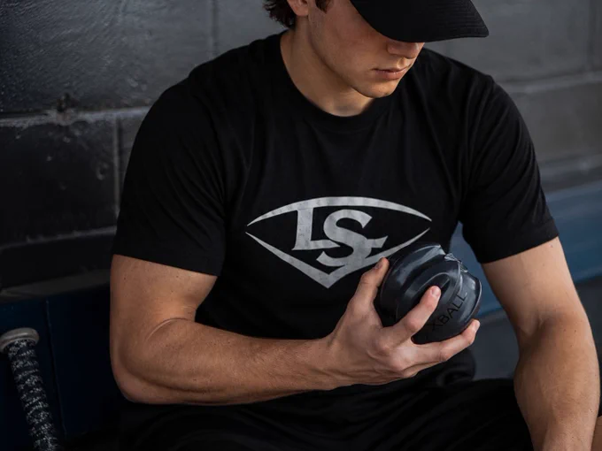 The Louisville Slugger XBALL being used for pre-game activation of hands and forearms.