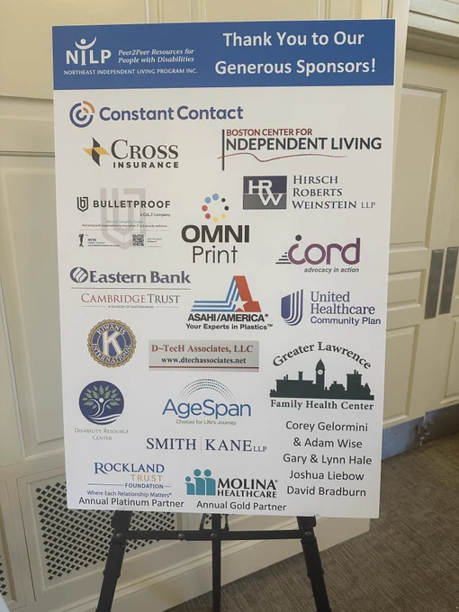 Signboard listing generous sponsors supporting the Northeast Independent Living Program, featuring various healthcare, insurance, and community organizations.