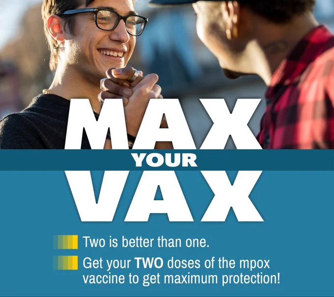Two people fist bump outdoors promoting getting two doses of the mpox vaccine for full protection.