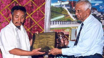 Lhasang Tsering (1952-2026), an outspoken advocate for Tibetan independence and former resistance fighter, has passed away in Dharamshala. Rest in power!
(Photo: Maj. Gen. (Retd.) Eustace D'Souza, PVSM, presents a Plaque of Appreciation to Lhasang Tsering on the behalf of Friends of Tibet on Dec 10 2001, Mumbai)