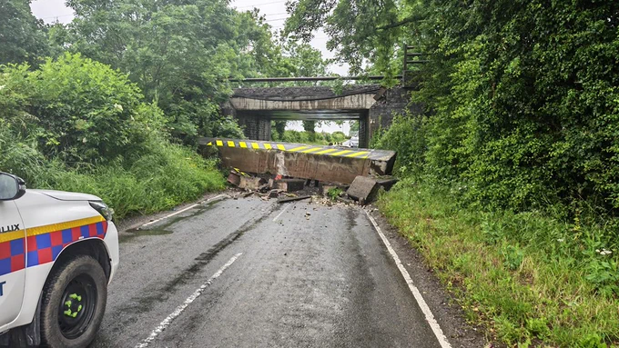 Image shows significant damage to railway bridge near Nuneaton