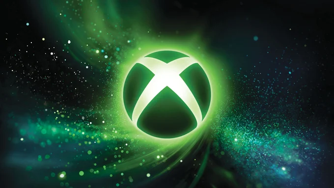 Glowing Xbox logo centered on a dark background with green light effects and particle streaks, representing Xbox Games Showcase 2026.
