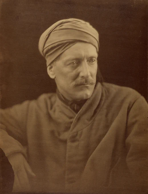Portrait of diplomat, linguist, and explorer William Palgrave in a colonial-style cloak and turban.