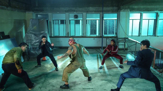 A man is surrounded by 4 martial artists in the movie The Furious. 