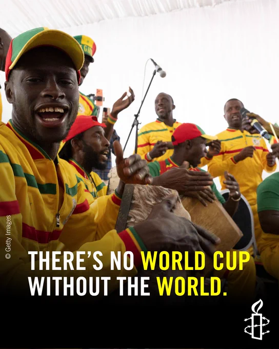 Musicians in colorful outfits, with traditional drums and microphones, perform energetically. They wear attire in red, green, and yellow. The image includes the logos of Getty Images and Amnesty International. Text overlay reads: "There's No World Cup Without The World."