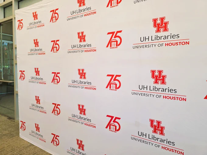 step and repeat featuring md anderson library 75th anniversary logo