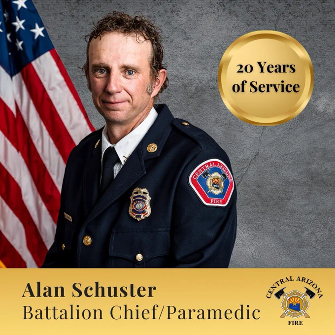 Golden graphic that includes Chief Schuster’s department photo with American flag. Text reads, “20 years of service”.