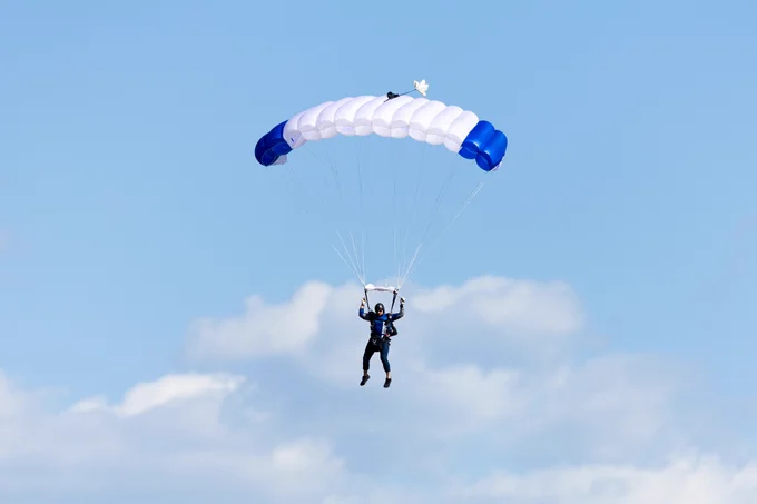 A person parachuting at the U.S. Air Force Academy.