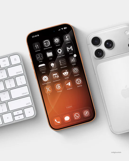 Modern iPhone mockup featuring a dark orange and black gradient wallpaper with subtle curved glass-like lines. The phone is displayed at an angle on a clean light gray surface beside a white keyboard and a silver iPhone, showcasing monochrome-themed app icons and a warm, premium aesthetic.
