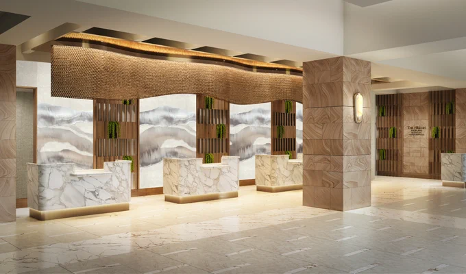 Hotel arrival experience at The Westin Kierland Resort & Spa renovation in Scottsdale Arizona with marble reception desks and warm layered finishes
