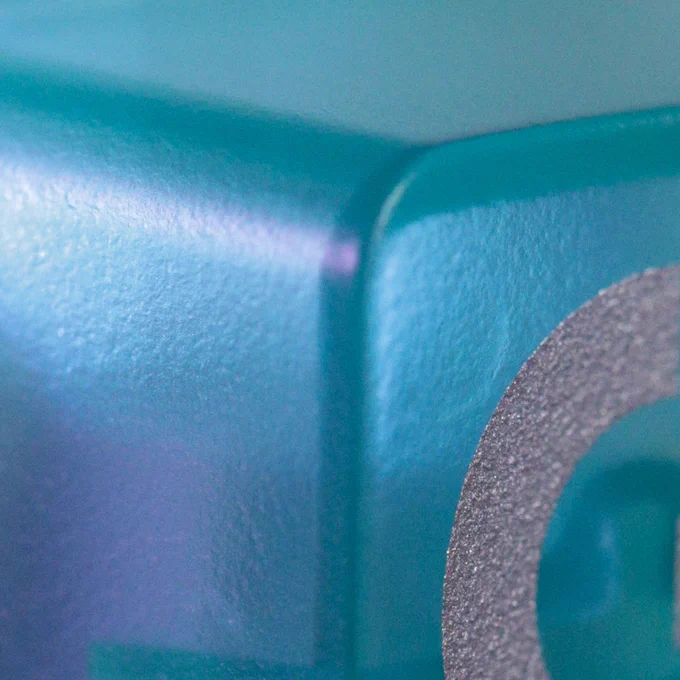 A close up photo of a Logitech G product element. It contains the words “Keep Playing” on it. 