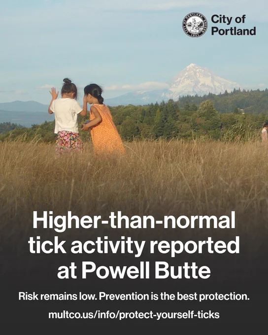 Photo of two young people walking in the grass at Powell Butte Park, Mt. Hood is visible in the background. Text reads “Higher-than-normal tick activity reported at Powell Butte. Risk remains low. Prevention is the best protection.” multco.us/info/protect-yourself-ticks. City of Portland seal and wordmark.