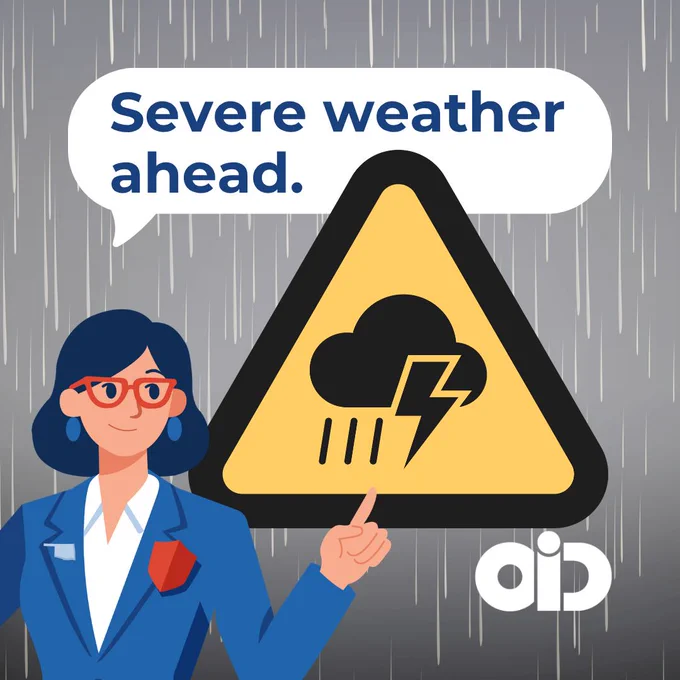 A person wearing glasses and a blue suit points to a caution sign featuring a cloud and lightning bolt. Text above reads, "Severe weather ahead." The Oklahoma Insurance Department appears in the corner." Rain is falling in the background.