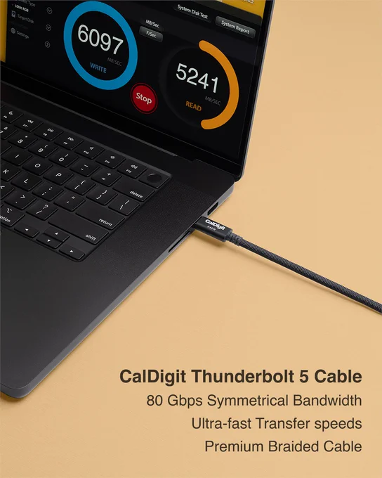 CalDigit Thunderbolt 5 cable plugged into a MacBook Pro.
Text reads "80 Gbps Symmetrical Bandwidth.  Ultra-fast Transfer Speeds.  Premium Braided Cable."