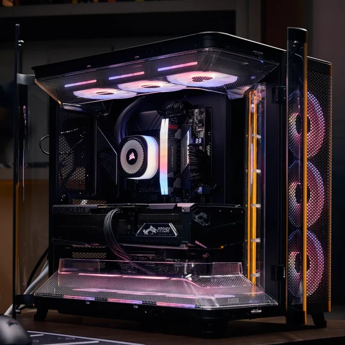 An image of a black CORSAIR Air 5400 case, with open doors towards the viewer. The internal components have a pale, soft pink coloration with accents of cobalt blue.