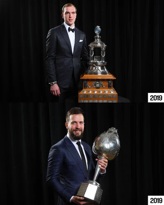Top: Andrei Vasilevskiy with the Vezina Trophy in 2019.\n\nBottom: Nikita Kucherov with the Hart Memorail Trophy in 2019.