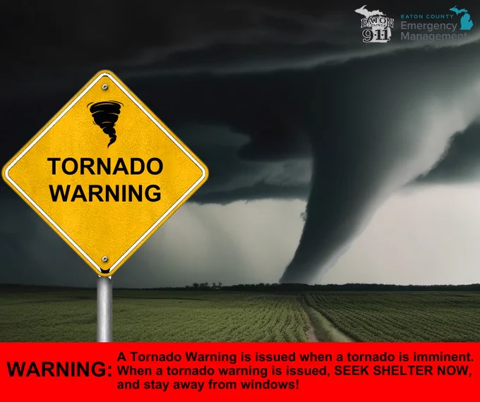A yellow road sign reads "Tornado Warning". In the background, a dark and ominous sky with a large tornado touching down in an open field. A caption at the bottom reads "WARNING: A Tornado Warning is issued when a tornado is imminent. When a tornado warning is issued, SEEK SHELTER NOW, and stay away from windows!"