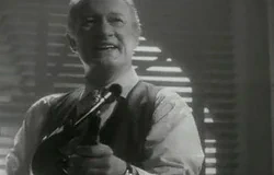 Still from Angels with Filthy Souls. Johnny Valentine wields a Tommy gun