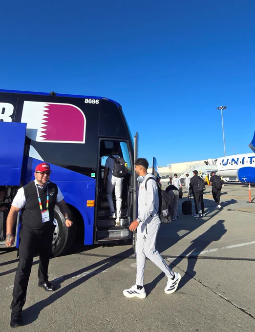 Soccer players from Team Qatar board their bus at San Jose Mineta International Airport.